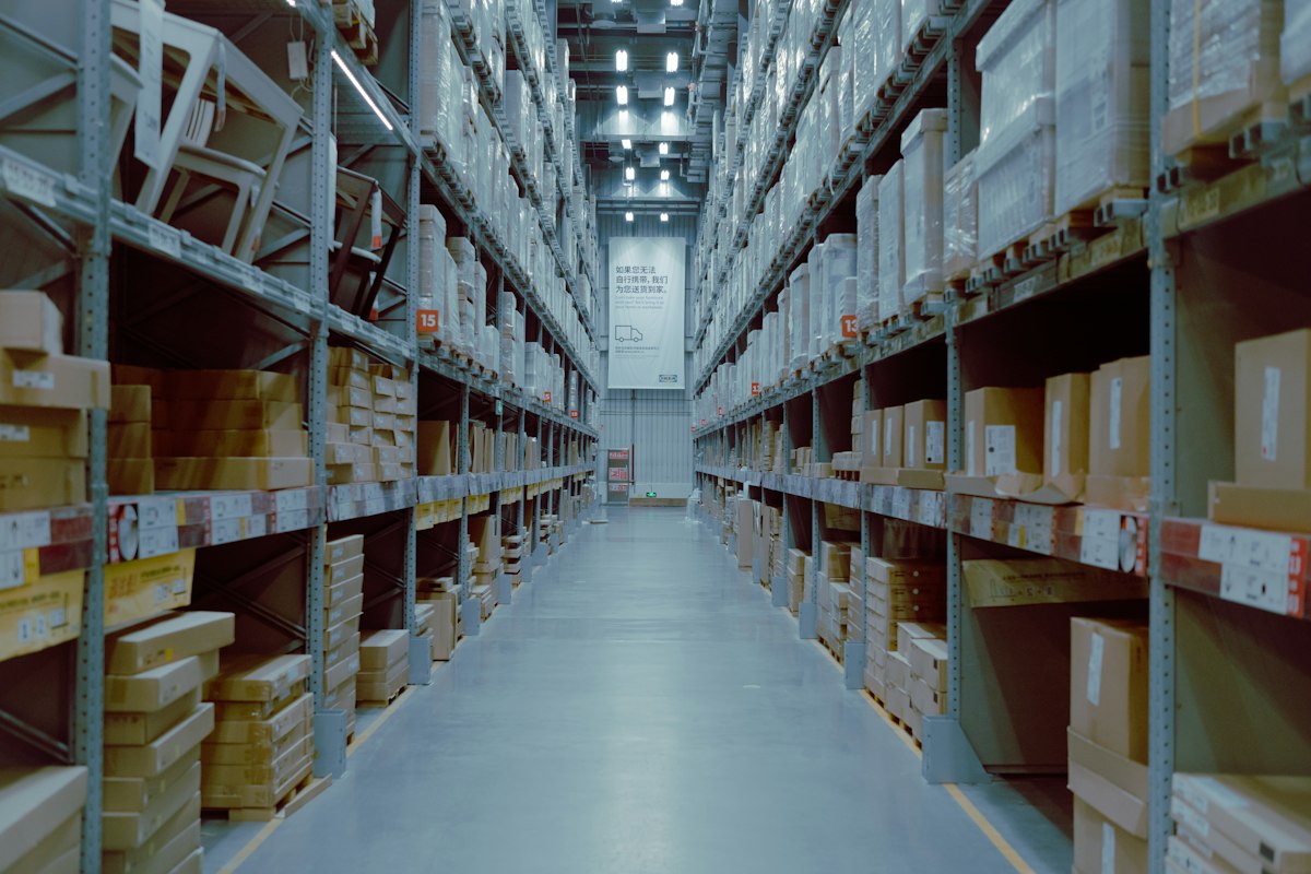 Warehouse aisle with stocked shelves